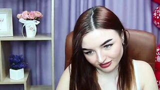 Redhead babe flashes big natural tits