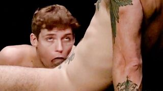 Romeo Davis stands and spits on his thick dick before slowly pushing it into the boy'