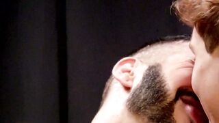 Romeo Davis stands and spits on his thick dick before slowly pushing it into the boy'