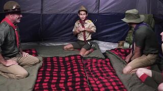 Scoutmasters Ace Banner and Adam Snow bang the two young twinks in the tent