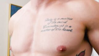 Muscular dude Damien White masturbates solo in front of the camera