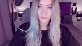 Blonde teen SimaDark smoking vape and stripping off on solo webcam show