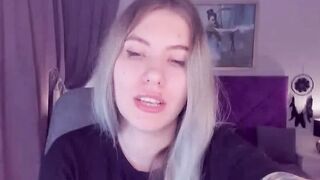 Blonde teen SimaDark smoking vape and stripping off on solo webcam show
