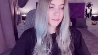 Blonde teen SimaDark smoking vape and stripping off on solo webcam show
