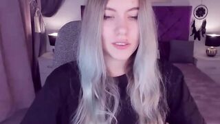 Blonde teen SimaDark smoking vape and stripping off on solo webcam show