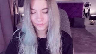 Blonde teen SimaDark smoking vape and stripping off on solo webcam show