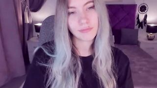 Blonde teen SimaDark smoking vape and stripping off on solo webcam show