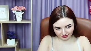 Busty redhead Eswatini amateur woman NicolPot posing in bra and tights on webcam