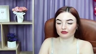 Busty redhead Eswatini amateur woman NicolPot posing in bra and tights on webcam
