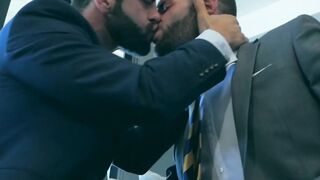 Suited Hector De Silva flips sexy Axel Max over and fucks him deep