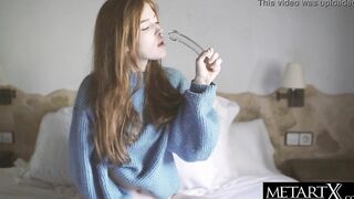 Cutie red haired fucks her vagina to an orgasm with a huge glass sex toy