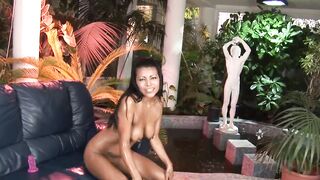 By the pool the gorgeous cougar fucks her butt with a big vibrator