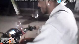 erotic into the street on top of the motorcycle showing titties with Joao O Safado