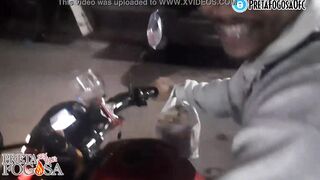 erotic into the street on top of the motorcycle showing titties with Joao O Safado