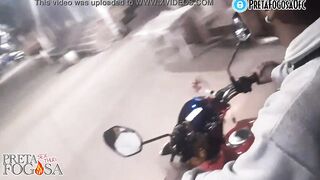 erotic into the street on top of the motorcycle showing titties with Joao O Safado