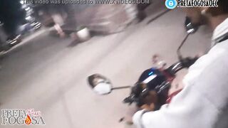 erotic into the street on top of the motorcycle showing titties with Joao O Safado
