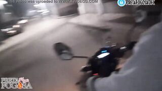 erotic into the street on top of the motorcycle showing titties with Joao O Safado