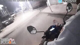 erotic into the street on top of the motorcycle showing titties with Joao O Safado