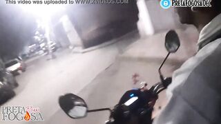 erotic into the street on top of the motorcycle showing titties with Joao O Safado