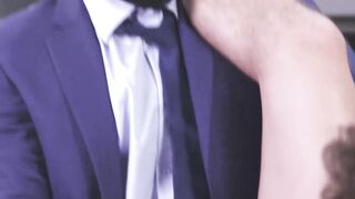 Sexy Trevor Cruz sits the big black cock of suited Braxton Cruz