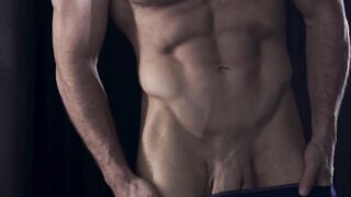 Muscular Chuck Conrad stripped down his pants and started jacking off