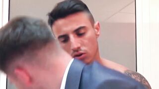 Hottie Robbie Rojo rides dick while jerking his cock by suited Xavi Duran