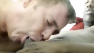 Giving a sexy blowjob to gay amateur James big black cock until he squirts in bed