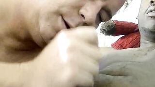 Giving a sexy blowjob to gay amateur James big black cock until he squirts in bed