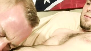 Hairy muscled gay Seg spread wide his legs and lets his cock and balls be consumed