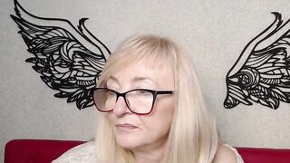 Blonde amateur MILF with glasses
