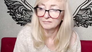 Blonde amateur MILF with glasses