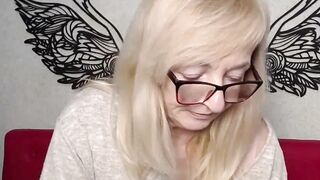 Blonde amateur MILF with glasses