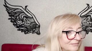 Blonde amateur MILF with glasses