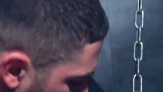 Leather clad Dato Foland pounds the warm ass hole of suited Logan Moore