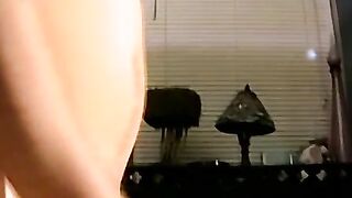 A bald black dude with a massive cock rubbing it til he cums