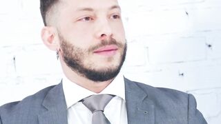 Sexy Javi Gray pounds his ass into the thick cock of suited John Brachalli