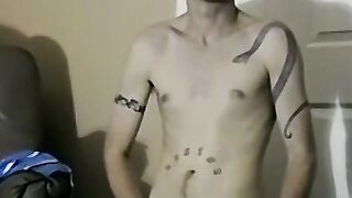 Handsome young model shoots hot cum on a towel