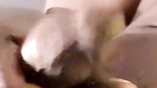 Big dude helps twink relax by sucking his thick black cock