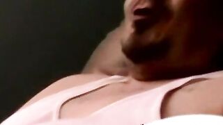 Big muscular hunk jerks off his enormous cock