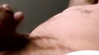 Big muscular hunk jerks off his enormous cock
