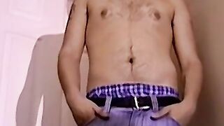 Handsome lad shows off his amazing body and dick