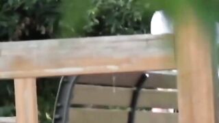 Tempting Japanese in skirt peeing behind seat in park