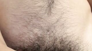 Attractive twink thug strokes his hairy dick and cums solo