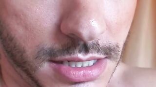 Tattooed jock dry humping the couch and jerking off solo