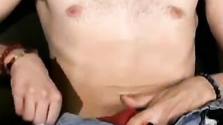 Slim twink tugs on his throbbing dick in this classic video