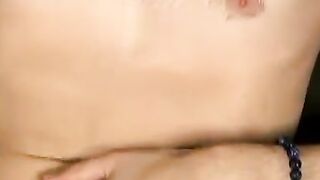 Slim twink tugs on his throbbing dick in this classic video