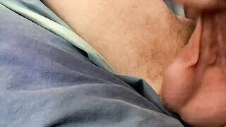 Novice twink Aaron Slater showing off his sexy feet while stroking his cock