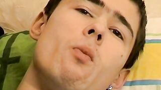 Young Marivelli hops on the couch and starts his smoking and jerking session