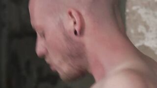 DP with submissive guy taking it from both ends with hot wax
