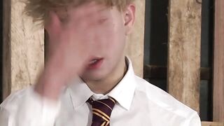 Blond twink gets an ass spanking while in his school uniform
